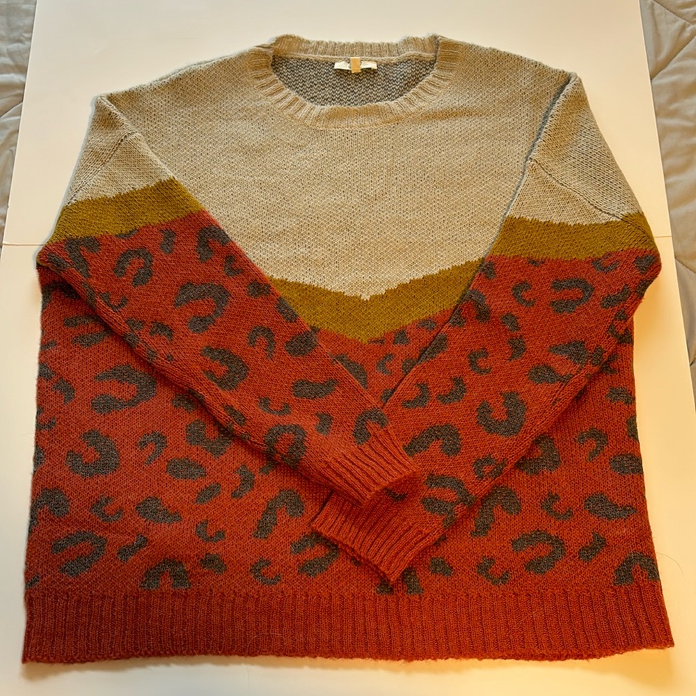 easel crewneck sweater